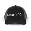 Learning... Snapback Trucker Cap
